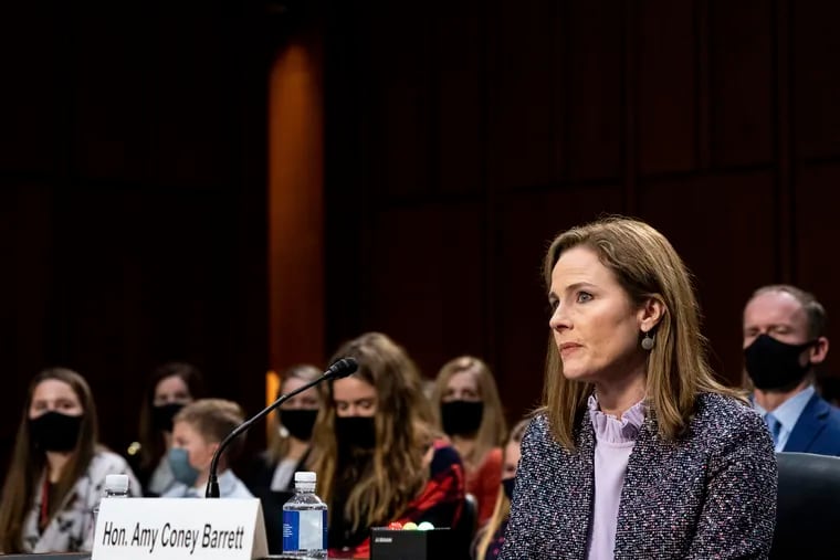 Supreme Court nominee Amy Coney Barrett listens during a confirmation hearing before the Senate Judiciary Committee, Wednesday, Oct. 14, 2020, on Capitol Hill in Washington.