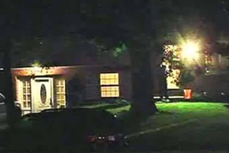 Police at scene of shootout during an apparent home invasion robbery in suburban Upper Gwynedd last night that left a bandit dead and the father of the house critically wounded.  (Photo / Fox29)