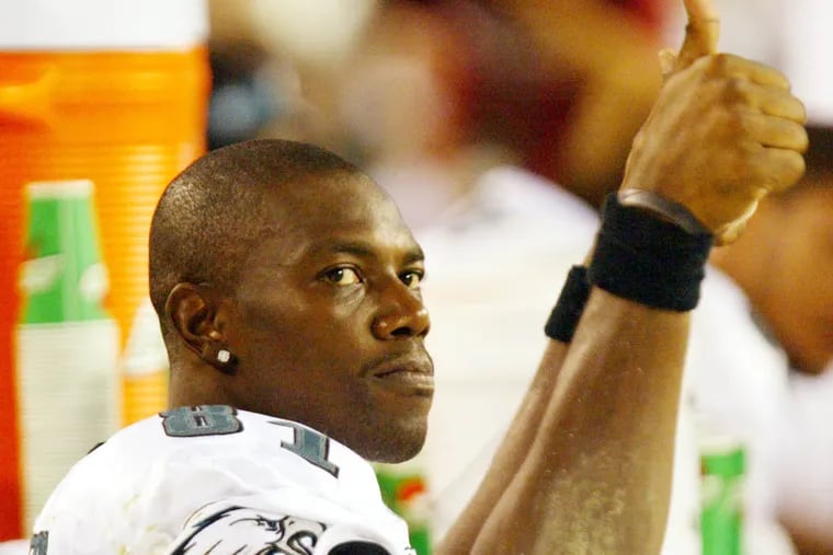 Terrell Owens wants to play for the Patriots, but also is putting time in at the bowling alley.  DN Photo/ Yong Kim