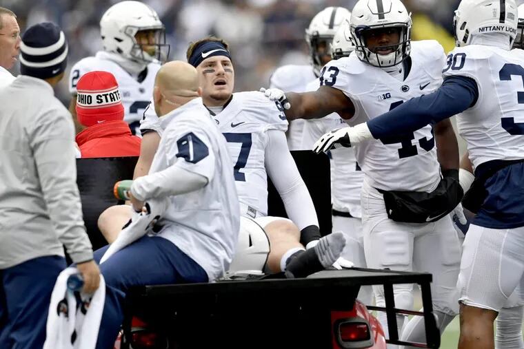 Penn State defensive end Ryan Buchholz is carted off the field in the first quarter against Ohio State with an undisclosed injury.