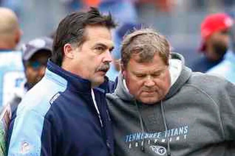 Titans coach Jeff Fisher (left) talks with offensive coordinator Mike Heimerdinger. The team never panicked after its 0-6 start, and many credit Fisher for the huge turnaround.