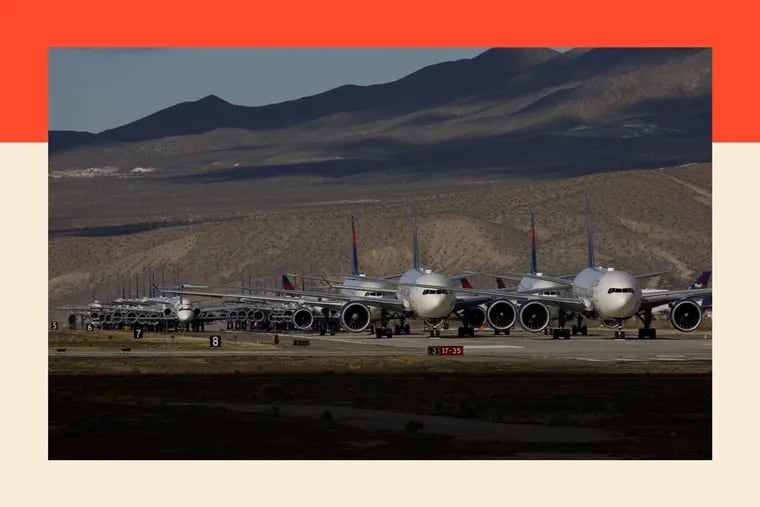 Delta Air Lines aircraft sit parked at a field in Victorville, Calif., on March 23, 2020.