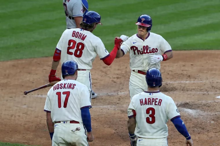 The Phillies exchanged a lot of high fives and fist bumps during their season-opening 5-1 homestand.