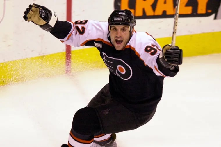 Rick Tocchet celebrates after scoring a goal for the Flyers in a playoff game against the New Jersey Devils in May of 2000.