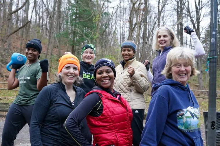 Yvonne Hardin (front center) poses with the workout group she leads at Northwestern Stables in Philadelphia, Pa. The group of women meet every Saturday morning for outdoor bootcamp-style class.