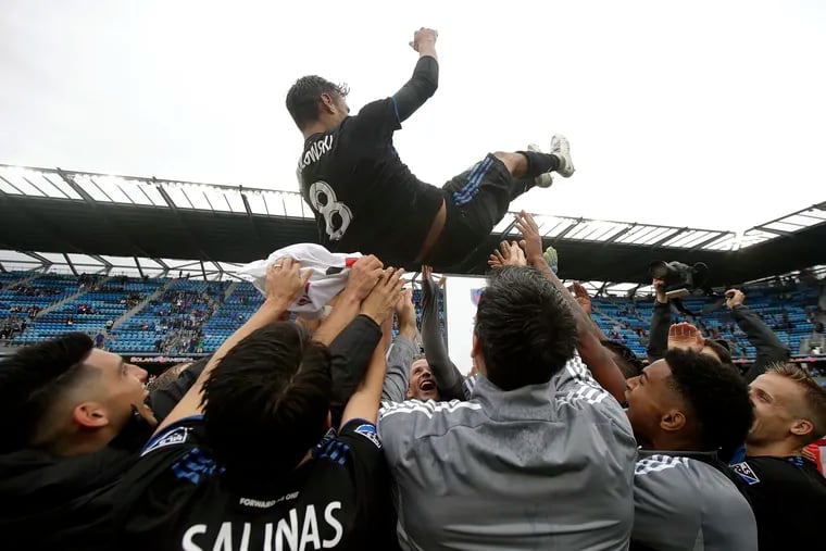 San Jose Earthquakes forward Chris Wondolowski is hoisted by teammates after they defeated the Chicago Fire in a game in which Wondolowski passed Landon Donovan to set the new MLS record for most career goals.