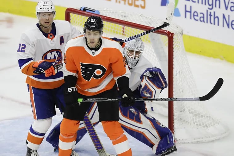 Flyers left wing James van Riemsdyk postions himself in front of the net against the Islanders on Friday. Flyers' forwards may spend a good deal of time there this season.