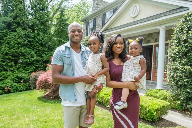 Cole and Erica Brown, with daughters Iyla, 3, and Ever, 2, are enjoying the space, privacy, and yard of their 6,000-square-foot Colonial in Bryn Mawr.