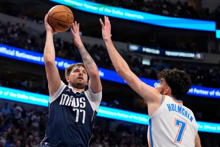 Luka Doncic #77 of the Dallas Mavericks is defended by Chet Holmgren #7 of the Oklahoma City Thunder during the second half at American Airlines Center on February 10, 2024 in Dallas, Texas. (Photo by Sam Hodde/Getty Images)