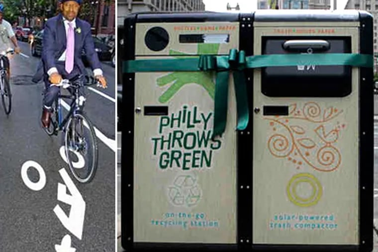 Mayor Nutter's Greenworks Philadelphia plan already has visible results. At left, Nutter takes a ride on the new bike lanes, and right, the new solar trash compactors have helped lower trash costs. (Clem Murray, Bonnie Weller / Staff Photographers)