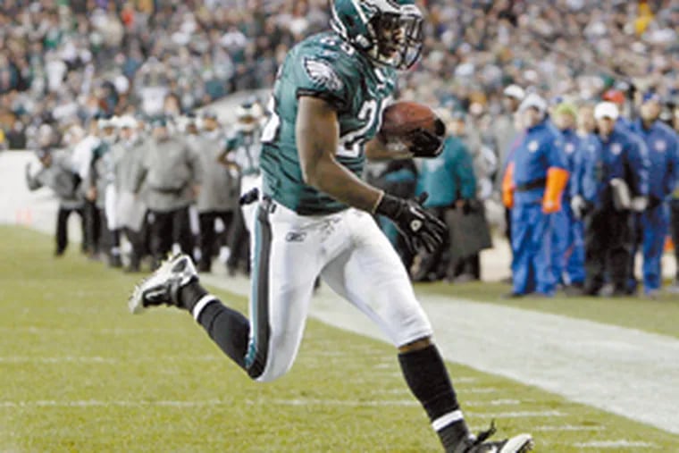 The Eagles’ LeSean McCoy scores the first of his two first-half touchdowns against Houston at Lincoln Financial Field. The Eagles improved to 8-4 and regained sole possession of first place in the NFC East with the 34-24 victory. The Birds’ next game will be at 8:20 p.m. Dec. 12 at Dallas.