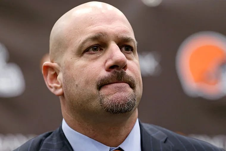 Browns coach Mike Pettine listens to a question during a news conference Thursday, Jan. 23, 2014, in Berea, Ohio. Buffalo's defensive coordinator, who met with team officials for the first time just a week ago, finalized a contract Thursday to become the Browns' seventh full-time coach since 1999. (Tony Dejak/AP)