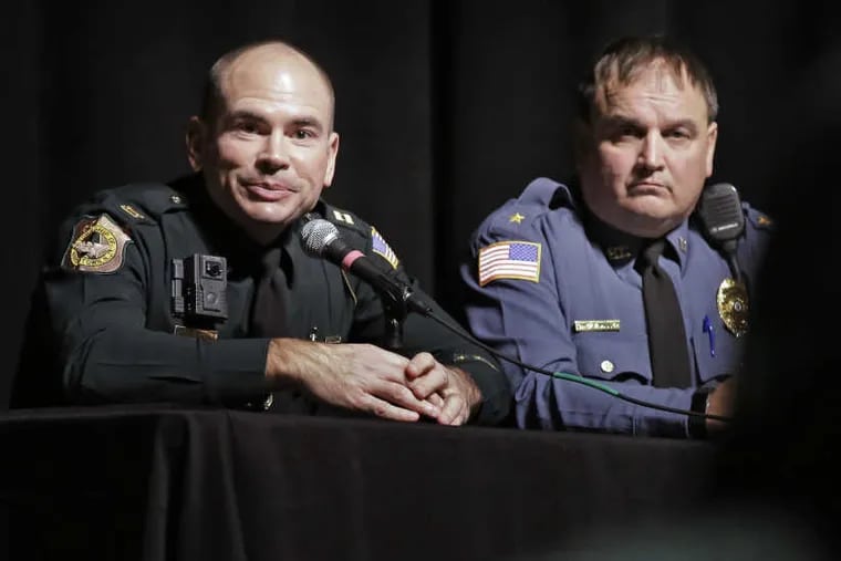 Bordentown Township acting Police Chief Brian Pesce and Bordentown City Police Chief Fred Miller listen to residents'; concerns during a Bordentown Township town hall meeting at the Bordentown Regional High School Auditorium on January 17, 2018.