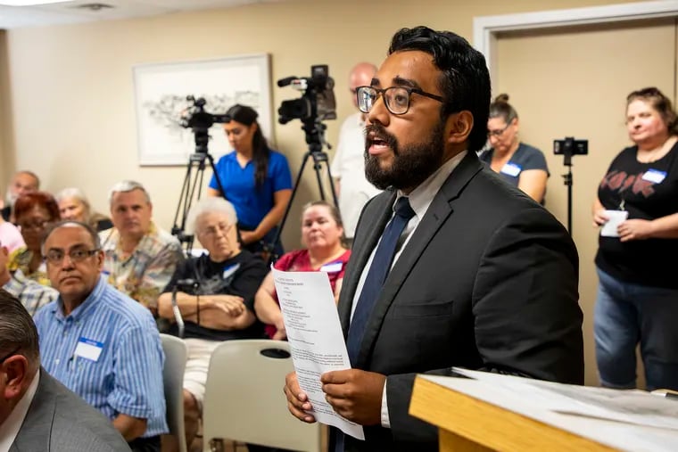 Cristian Moreno-Rodriguez, 23, of Atlantic City, N.J., speaks in front of the Atlantic County Board of Chosen Freeholders to bring awareness to resolution 447 that was withdrawn Tuesday.