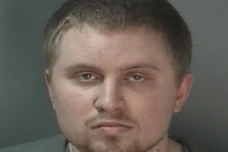 Basketball great Larry Bird's son has been arrested after police say he tried to run over his ex-girlfriend with a car. (Monroe County
Sheriff’s Office Handout/AP)