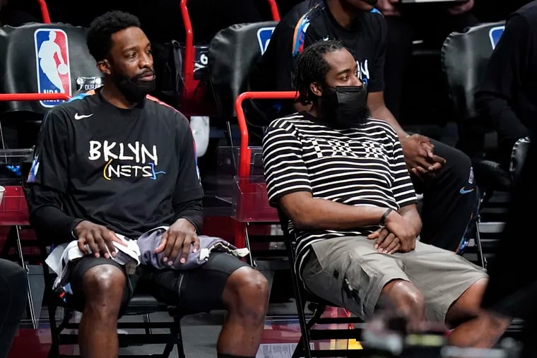 James Harden, right, will miss tonight's game against the Sixers.