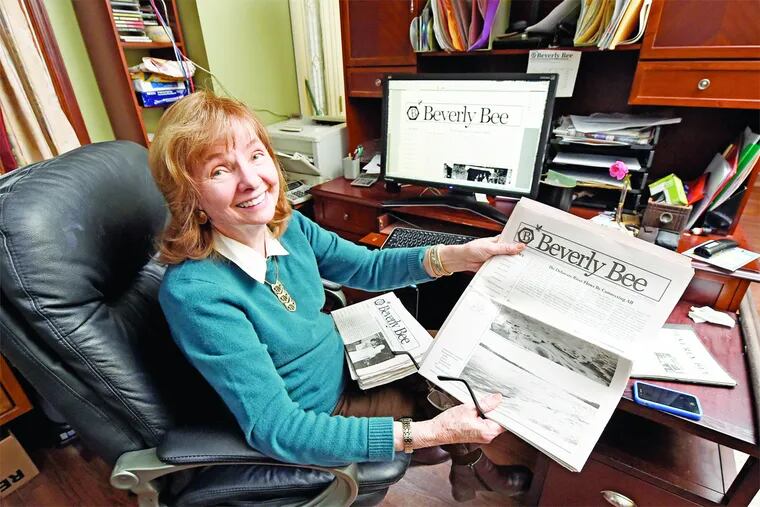 Beverly Haaf, 79, proudly displays a copy of her monthly newspaper, the Beverly Bee, in her Beverly, NJ, home office December 22, 2015.