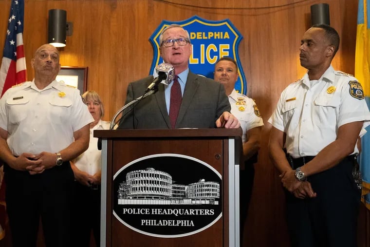 Mayor Jim Keeney speaks next to Police commissioner Richard Ross Jr. regarding the status of the "Facebook" post investigation at the Police Administration building in Center City, Philadelphia on Thursday, July 18, 2019.