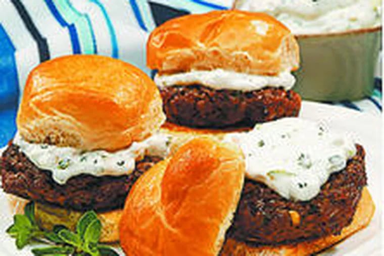 Lamb sliders with yogurt sauce , best eaten in a warm house in front of the TV.