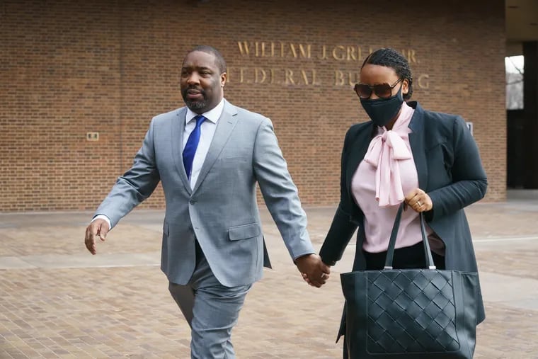 Councilmember Kenyatta Johnson (left) and his wife, Dawn Chavous, arrive at the federal courthouse in Philadelphia last week.