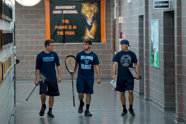 From left, triplets Will, Brian, and James Corliss at Barnegat High School on June 15. The three have done just about everything together for most of their lives and are graduating Friday near the top of their class. All are lacrosse players and all three are heading to Villanova University, where they will share a dorm room and pursue biology majors.