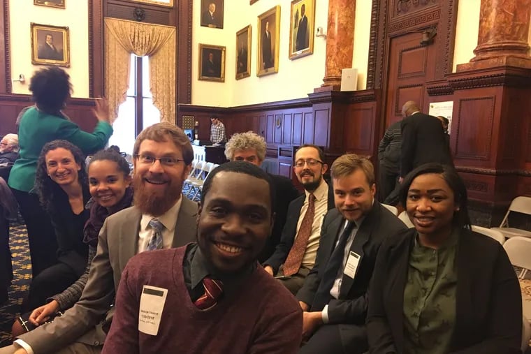 Community Legal Services staff at City Hall celebrate the Jan. 2018 announcement of the Philadelphia Eviction Prevention Project, a collaboration between the City and local nonprofits to help reduce evictions.