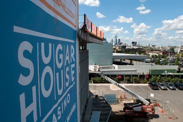 The expansion at SugarHouse Casino was cause for celebration on Thursday. SugarHouse plans to add 289 slot machines to its current 1,604 when the new space opens, possibly by the end of the year. (TRACIE VAN AUKEN/ For The Inquirer)