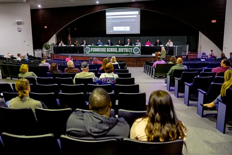 The Pennridge school board, pictured in this March file photo, voted 5-4 Monday to change graduation requirements, including dropping the number of required social studies credits at the high school from four to three.