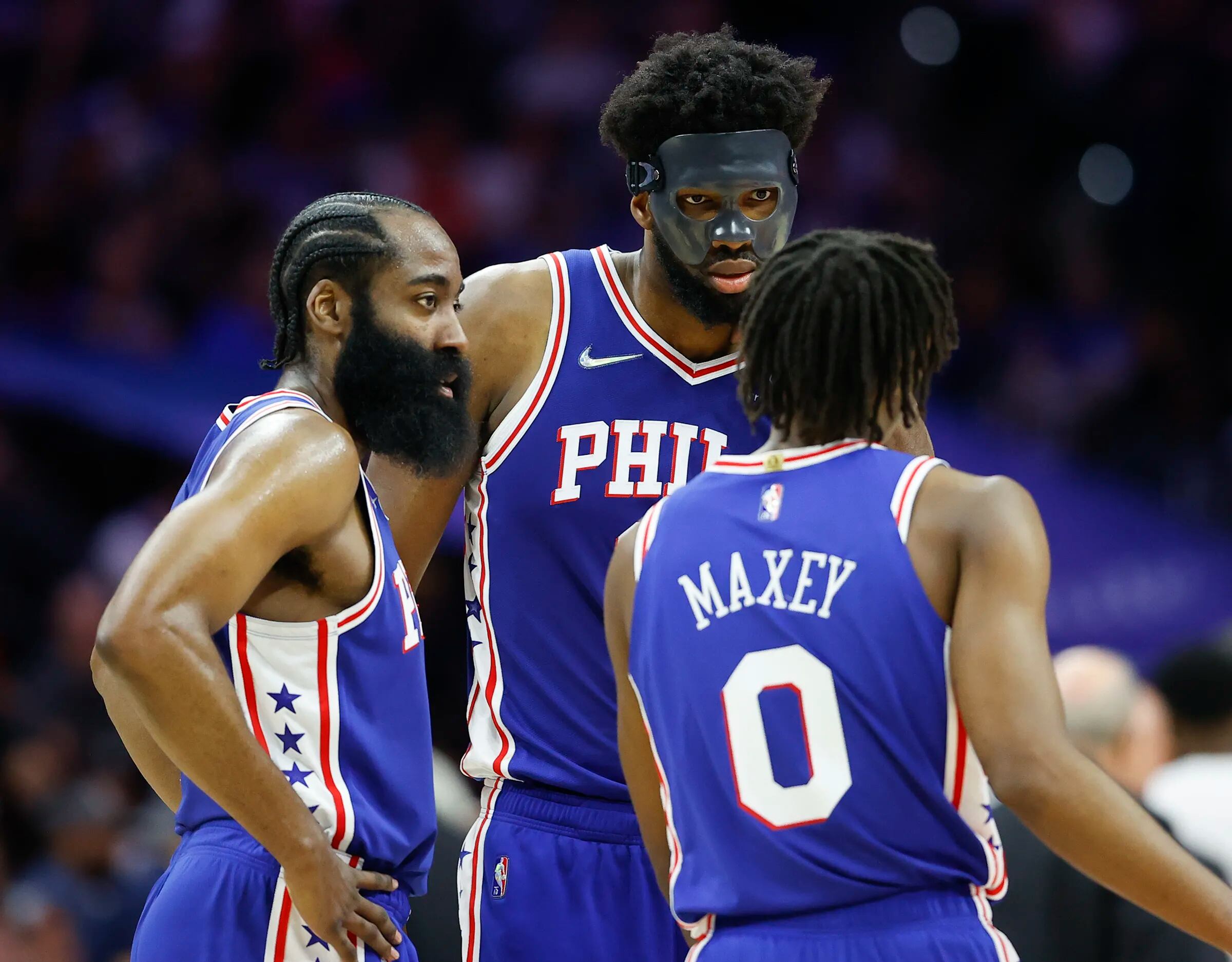 Sixers center Joel Embiid with guard James Harden and guard Tyrese Maxey against the Miami Heat during game six of the second-round Eastern Conference playoffs on Thursday May 12 2022 in Philadelphia