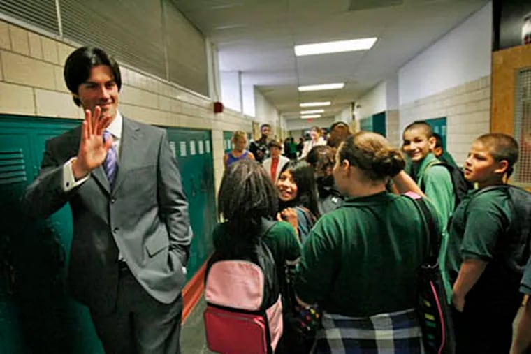 Phillies pitcher Cole Hamels and his wife Heidi toured the John B. Stetson Middle School in North Philadelphia on Thursday. The Hamels foundation donated money to the school, and they stopped by to see how the money was used to improve things for the students. (Alejandro A. Alvarez / Staff Photographer)
