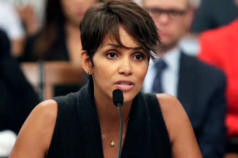 FILE - Actress Halle Berry testifies before the Assembly Committee on Public Safety for a bill that would limit the ability of paparazzi to photograph children of celebrities and public figures, on Tuesday, June 25, 2013 at the Capitol in Sacramento, Calif.  (AP Photo/Steve Yeater)