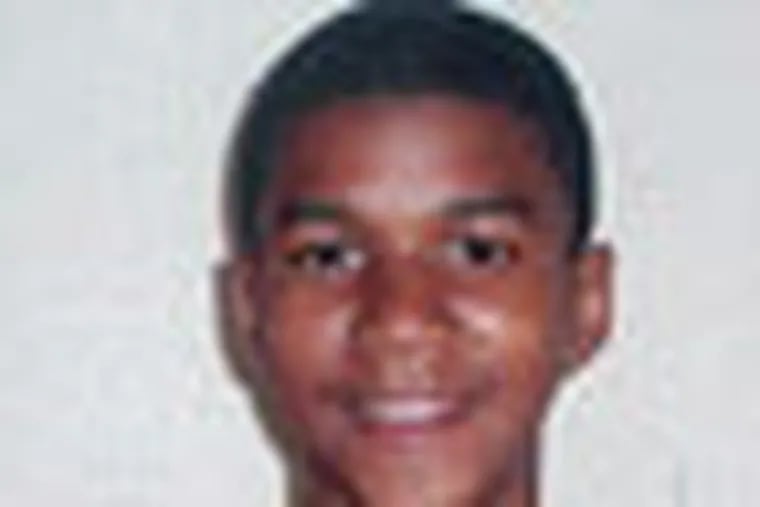 FILE - This undated file family photo shows Trayvon Martin. Martin was slain in the town of Sanford, Fla., on Feb. 26 in a shooting that has set off a nationwide furor over race and justice. Neighborhood crime-watch captain George Zimmerman claimed self-defense and has not been arrested, though state and federal authorities are still investigating. Since the slaying, a portrait has emerged of Martin as a laid-back young man who loved sports, was extremely close to his father, liked to crack jokes with friends and, according to a lawyer for his family, had never been in trouble with the law. (AP Photo/Martin Family, File)