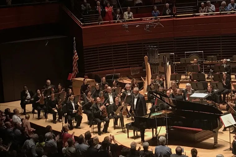 Following his Grieg Piano Concerto performance, Andre Watts bows to his Verizon Hall audience on Friday during the opening weekend of the Philadelphia Orchestra season.