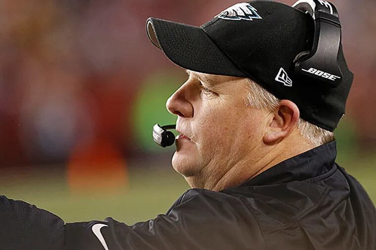 Chip Kelly watches from the sidelines against the Redskins. (Geoff Burke/USA Today)