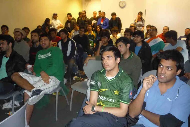 Fans watch the semifinal match between India and Pakistanin the World Cup cricket tournament. India came out on top.