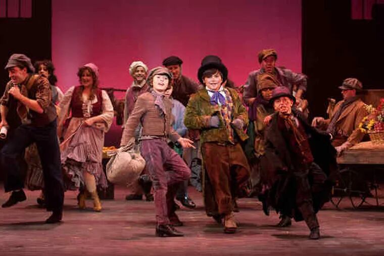 The cast of &quot;Oliver!&quot; performs the showstopper &quot;Consider Yourself.&quot; The show is at the Walnut through Jan. 10.