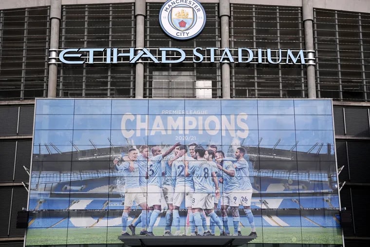 MANCHESTER, ENGLAND - APRIL 26: A detailed view of a Premier League banner outside the stadium ahead of the UEFA Champions League Semi Final Leg One match between Manchester City and Real Madrid at City of Manchester Stadium on April 26, 2022 in Manchester, England. (Photo by Laurence Griffiths/Getty Images)