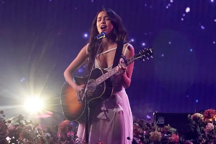 Olivia Rodrigo performs "Traitor" at the American Music Awards on Sunday, Nov. 21, 2021 at Microsoft Theater in Los Angeles.  She is up for eight Grammy awards on Sunday night.
