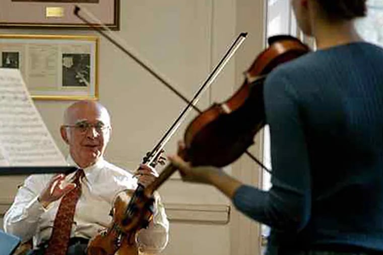 Curtis Institute of Music professor Joseph Silverstein coaches a violinist. Many at his school take beta-blockers for performance anxiety, but he is against it. (PETE CHECCHIA)
