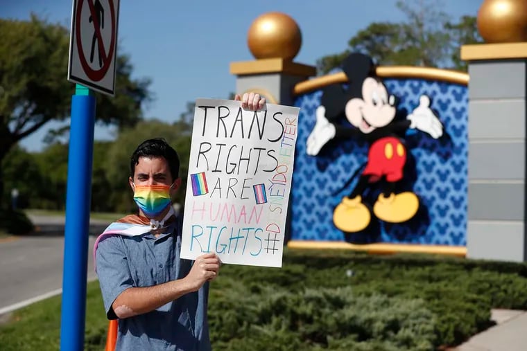 Disney employee Nicholas Maldonado at a March protest in Orlando against legislation passed in Florida known as the "Don't Say Gay" bill.