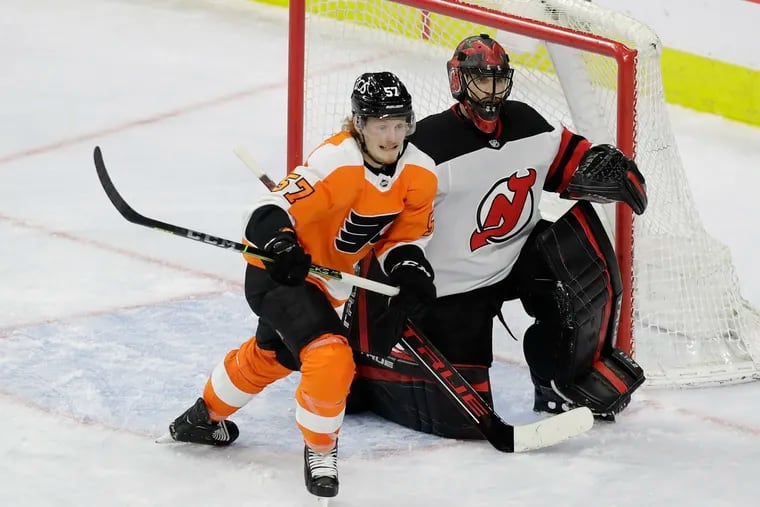 Flyers right winger Wade Allison skates past New Jersey Devils goaltender Scott Wedgewood in a game on May 10, 2021.