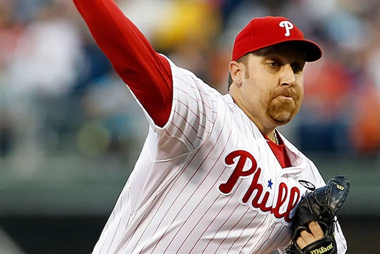 Phillies' pitcher Aaron Harang throws the baseball in the second-inning against the New York Mets on Thursday, August 27, 2015 in Philadelphia.