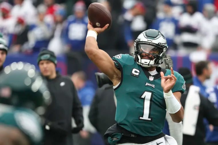 Eagles quarterback Jalen Hurts throws the football during pregame warm-ups before the Eagles play the New York Giants on Sunday, November 28, 2021 at MetLife Stadium in East Rutherford, New Jersey.