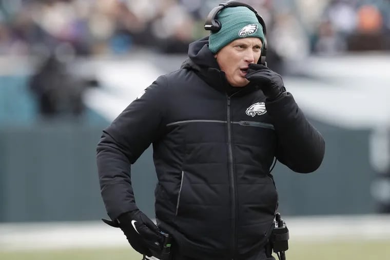 Eagles defensive coordinator Jim Schwartz talking on his headset against the Dallas Cowboys on Sunday, Dec. 31, 2017 at Lincoln Financial Field.