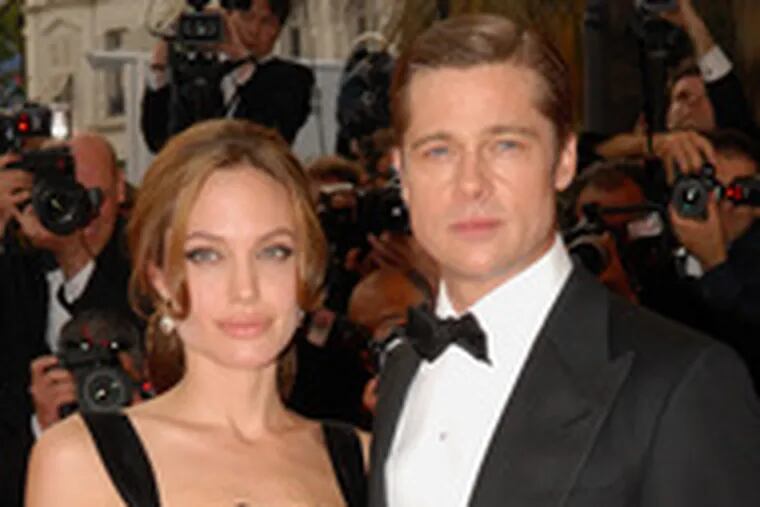 At the screening of &quot;A Mighty Heart&quot; at Cannes this week, Angelina and Brad stroll the red carpet. She plays the wife of a slain journalist.