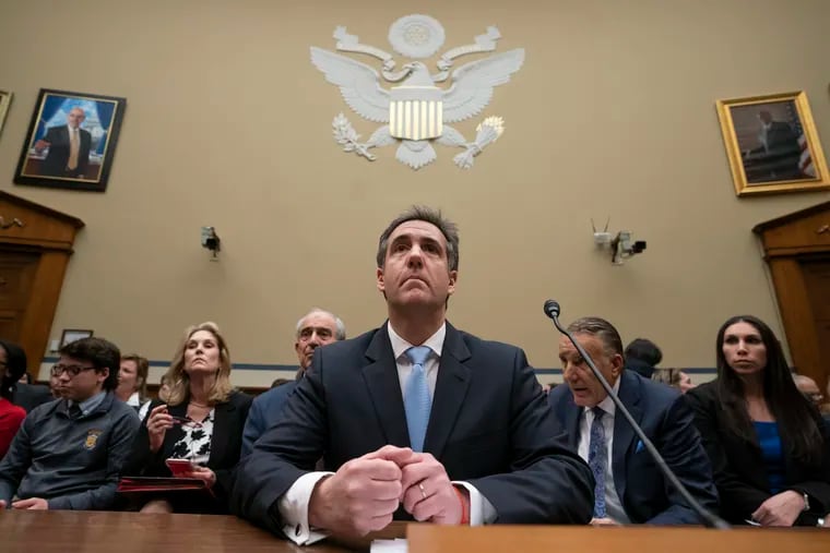Michael Cohen, President Donald Trump's former personal lawyer, listens as he finishes a day of testimony to the House Oversight and Reform Committee, on Capitol Hill in Washington, Wednesday, Feb. 27, 2019. (AP Photo/J. Scott Applewhite)