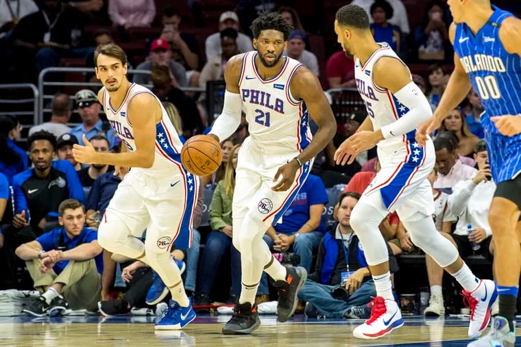 (From right) Ben Simmons, Joel Embiid, and Dario Saric lead a team dealing with lofty expectations for the first time in several years.