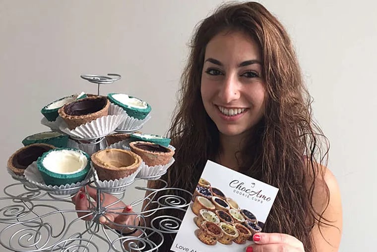 Michelle Silberman , founder of ChocAmo, with some of her cookie cups.