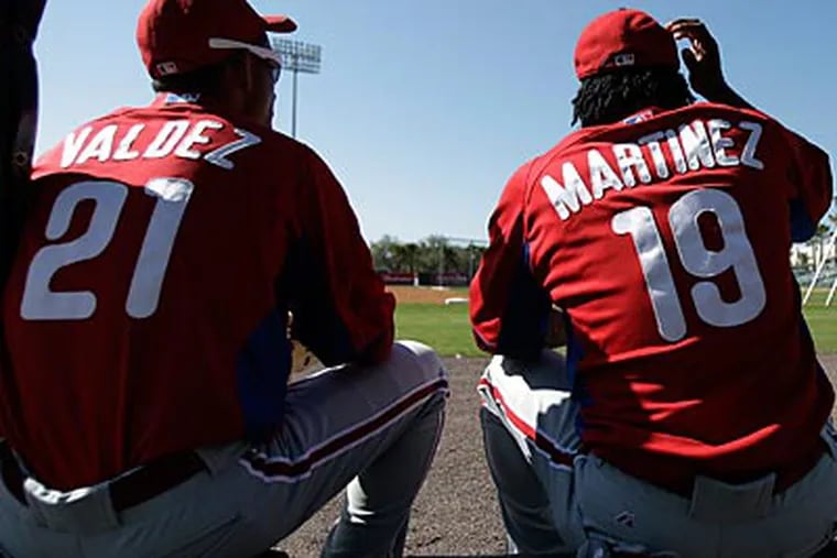 Wilson Valdez and Michael Martinez could play key roles coming off of the Phillies' bench. (David Maialetti/Staff Photographer)
