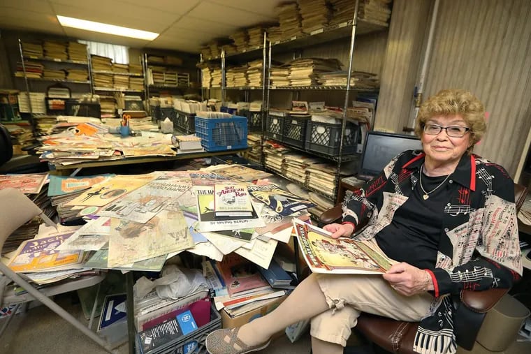 Sandy Marrone surrounded by what she calls “the tip of the iceberg” of her collection of vintage sheet music.